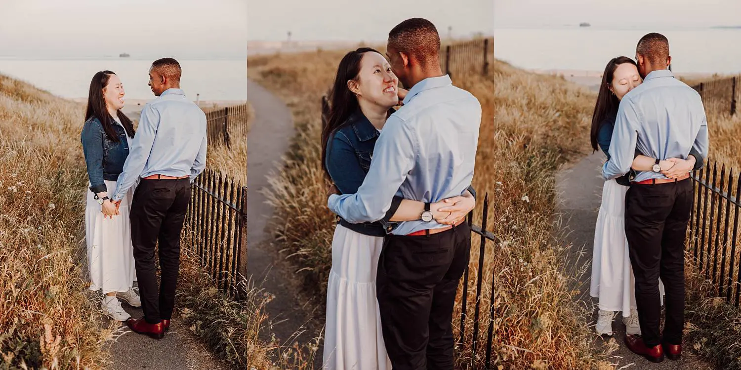 Couple hugging after surprise engagement in Portsmouth