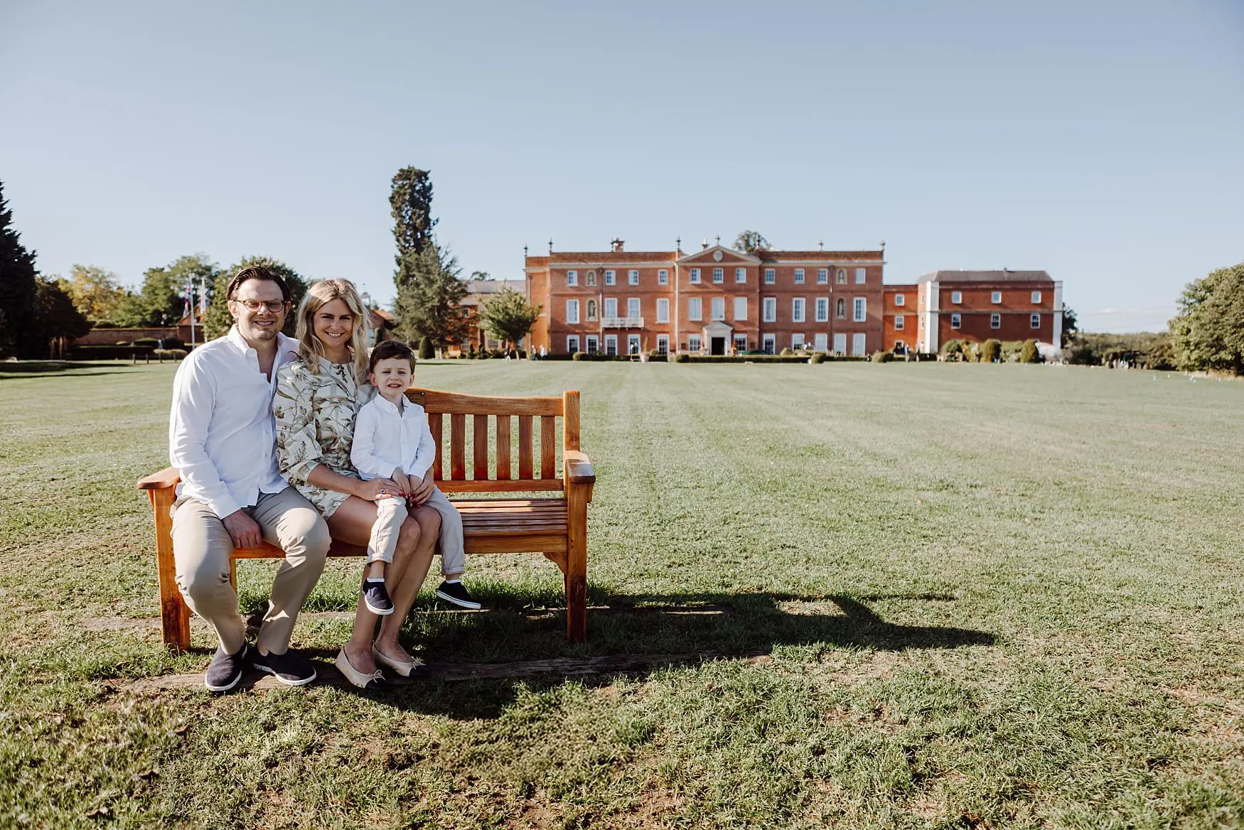 Natural laughter during outdoor family portraits in Hampshire countryside