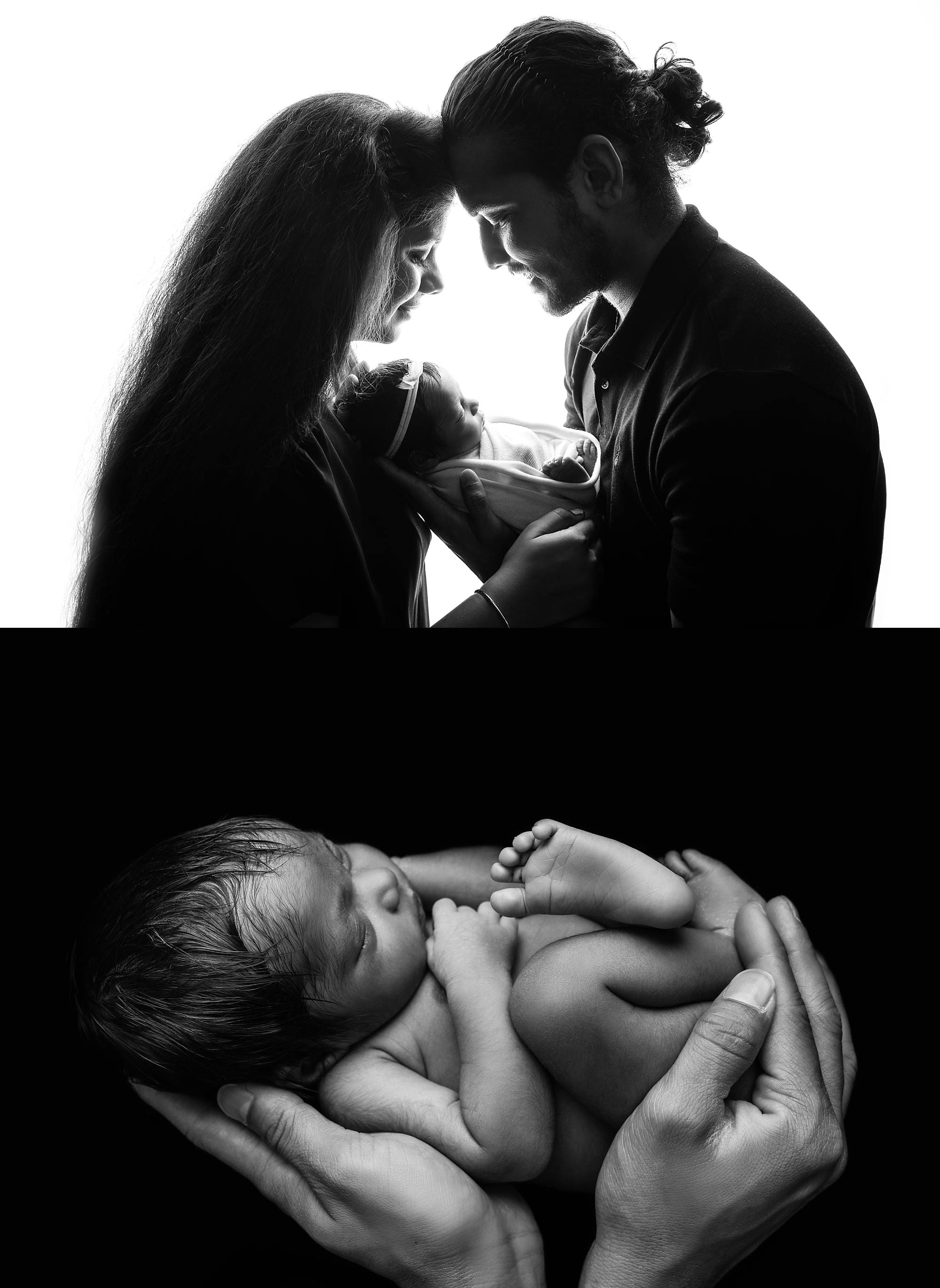 Newborn baby held by parents in black and white captured by photographer in Emsworth, Hampshire