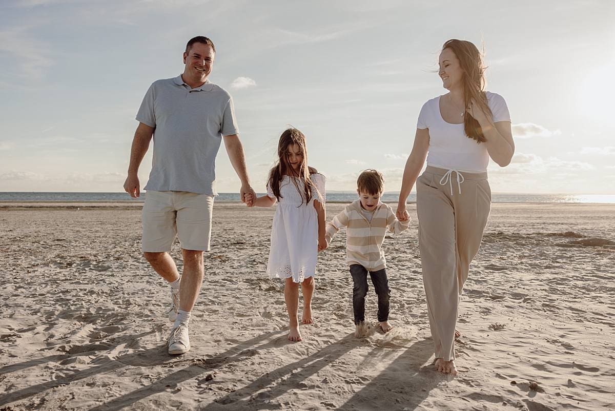 family on Witterings beach