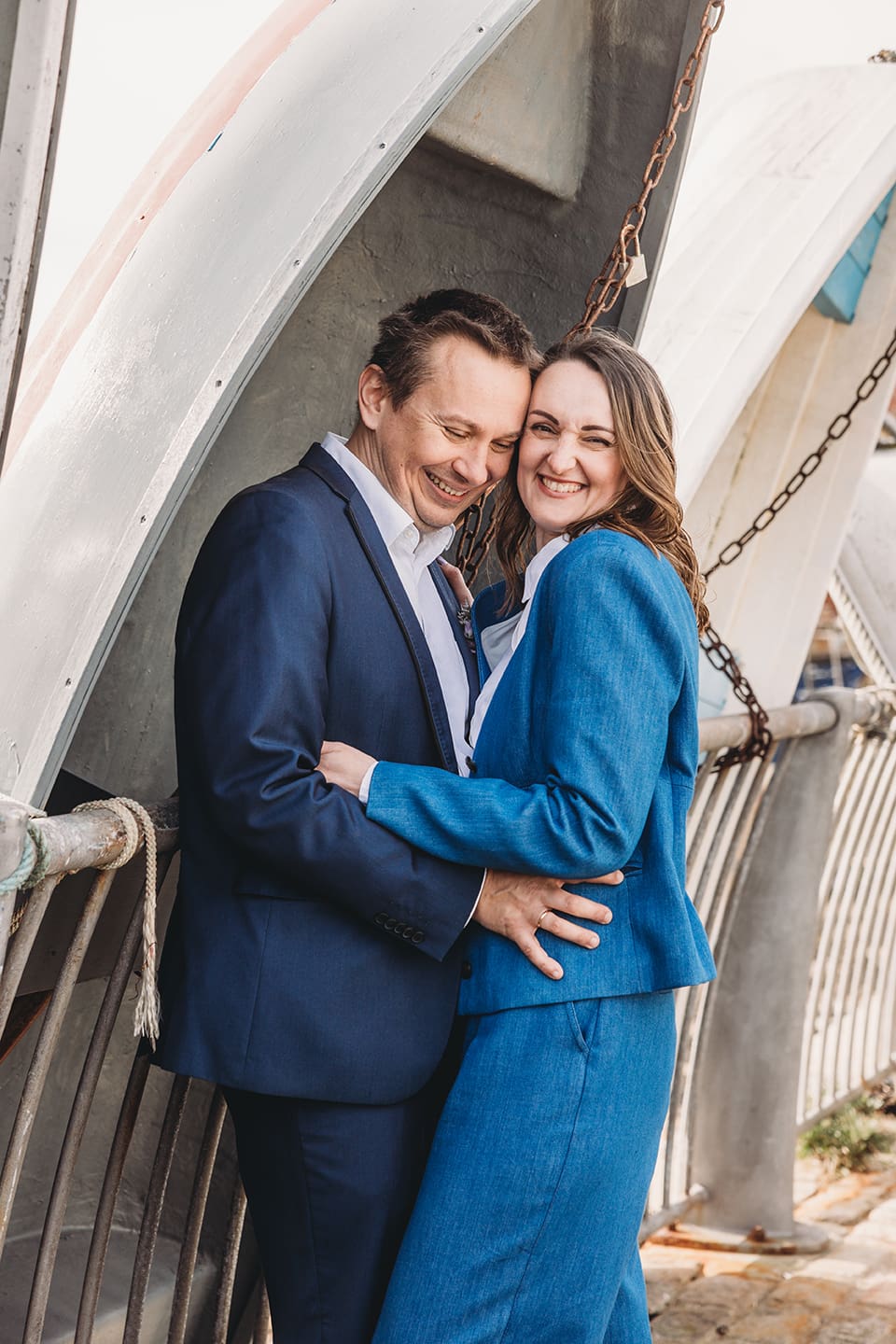 Portsmouth register office wedding photography couple on bicycle bride in blue linen suit