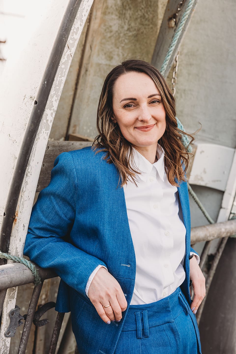 Portsmouth register office wedding photography couple on bicycle bride in blue linen suit