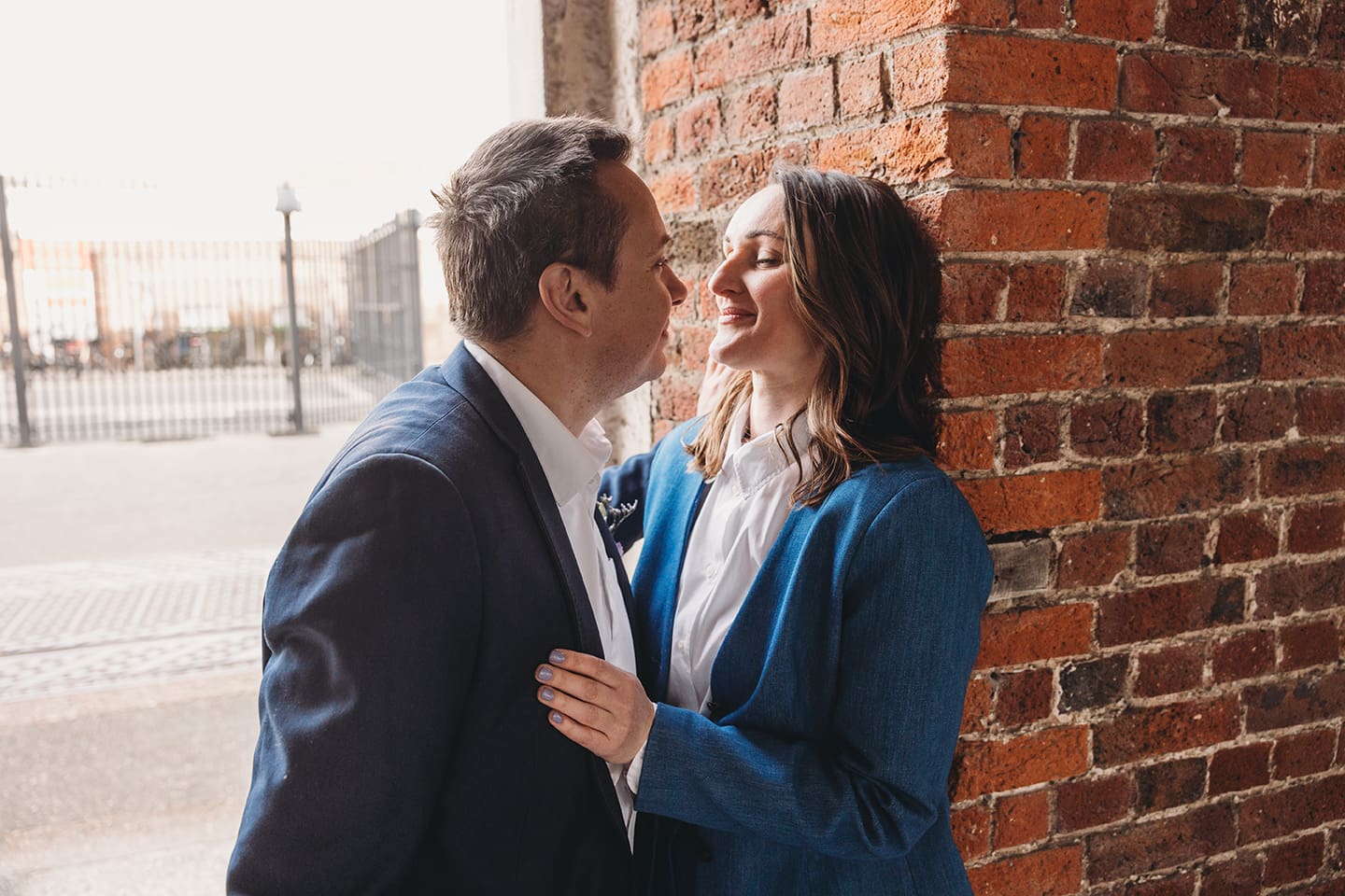 Portsmouth register office wedding photography couple on bicycle bride in blue linen suit