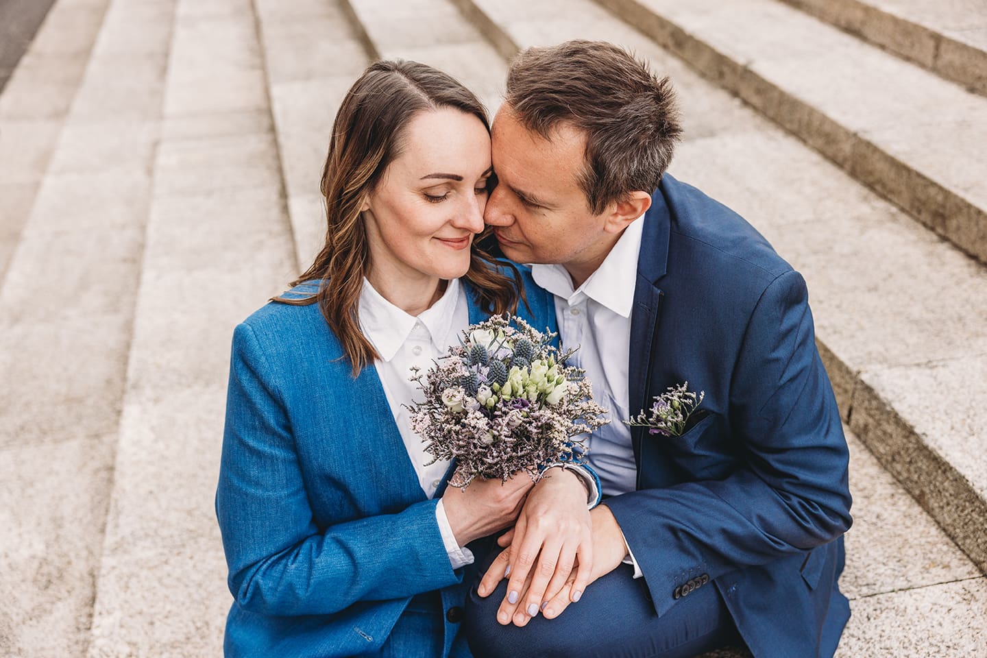 Portsmouth register office wedding photography couple on bicycle bride in blue linen suit
