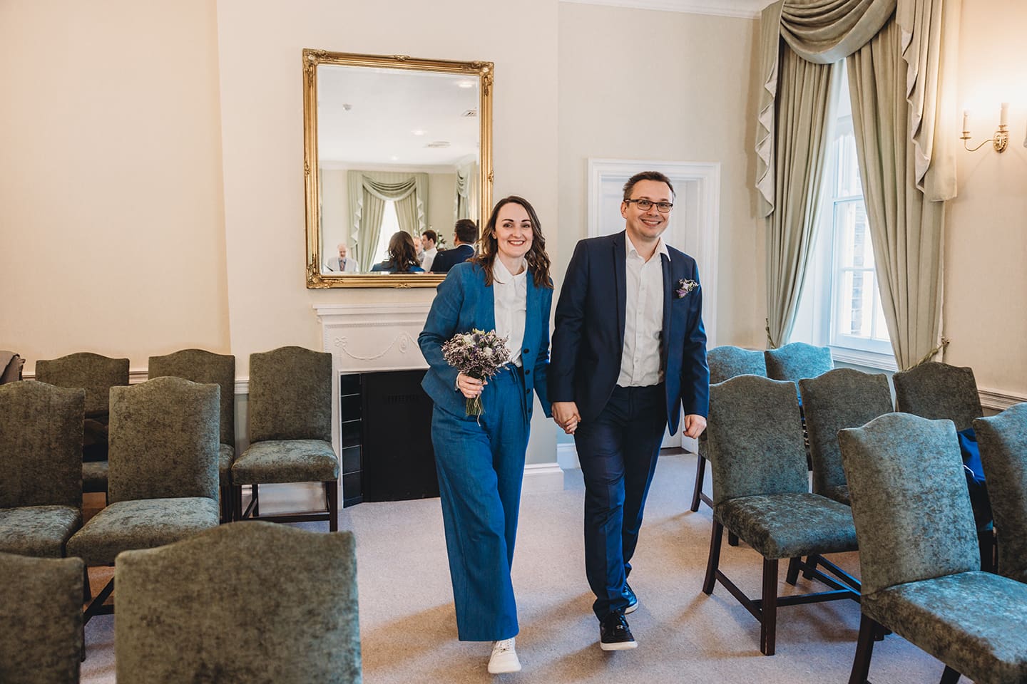 Portsmouth register office wedding photography couple on bicycle bride in blue linen suit