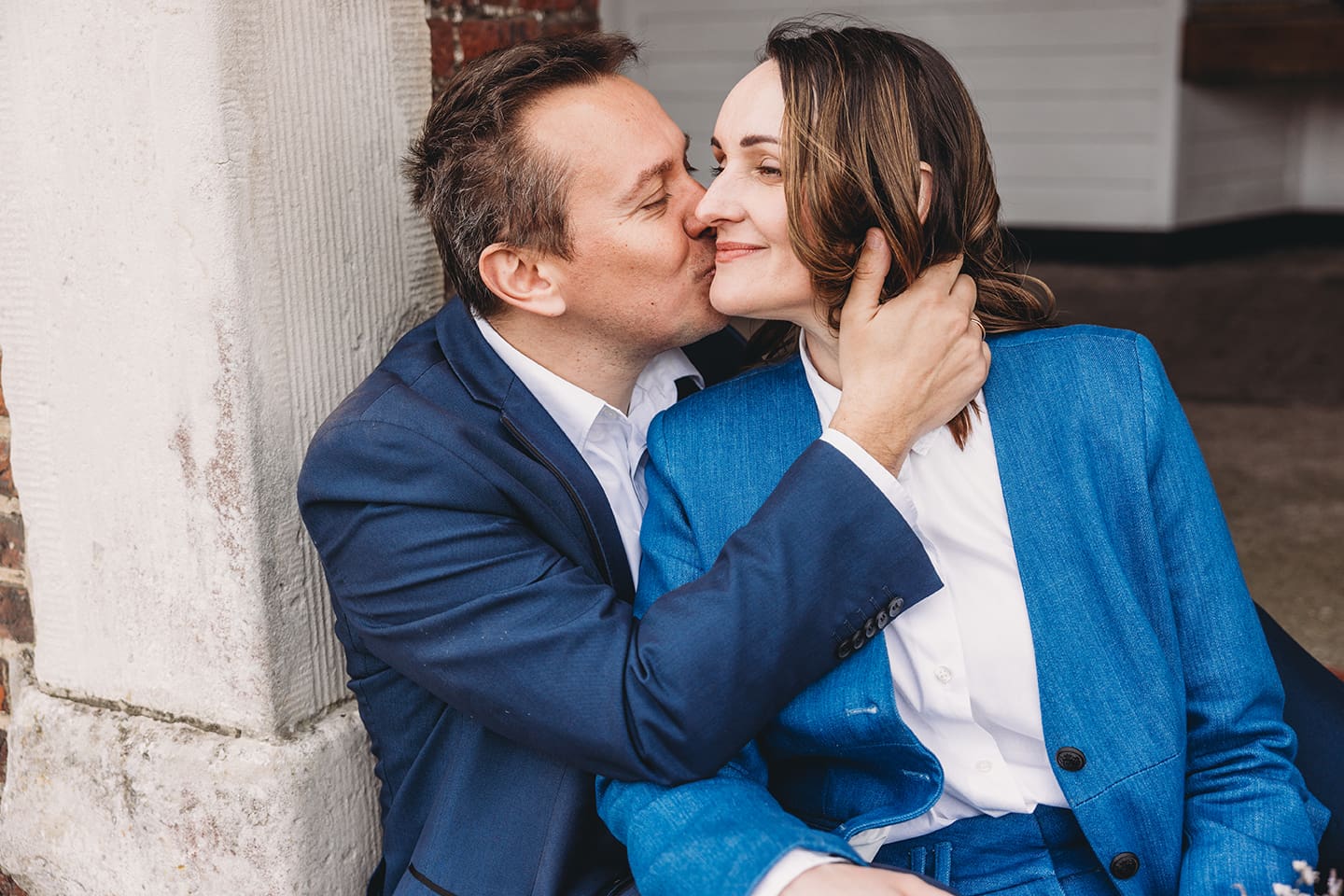 Portsmouth register office wedding photography couple on bicycle bride in blue linen suit