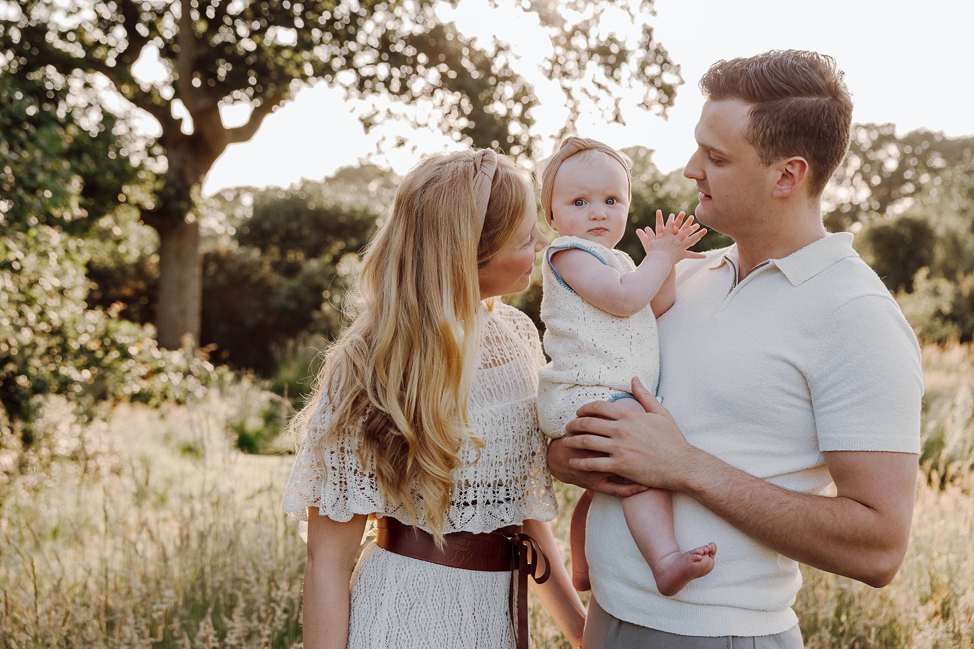 Family portrait in meadow near Waterlooville at sunset