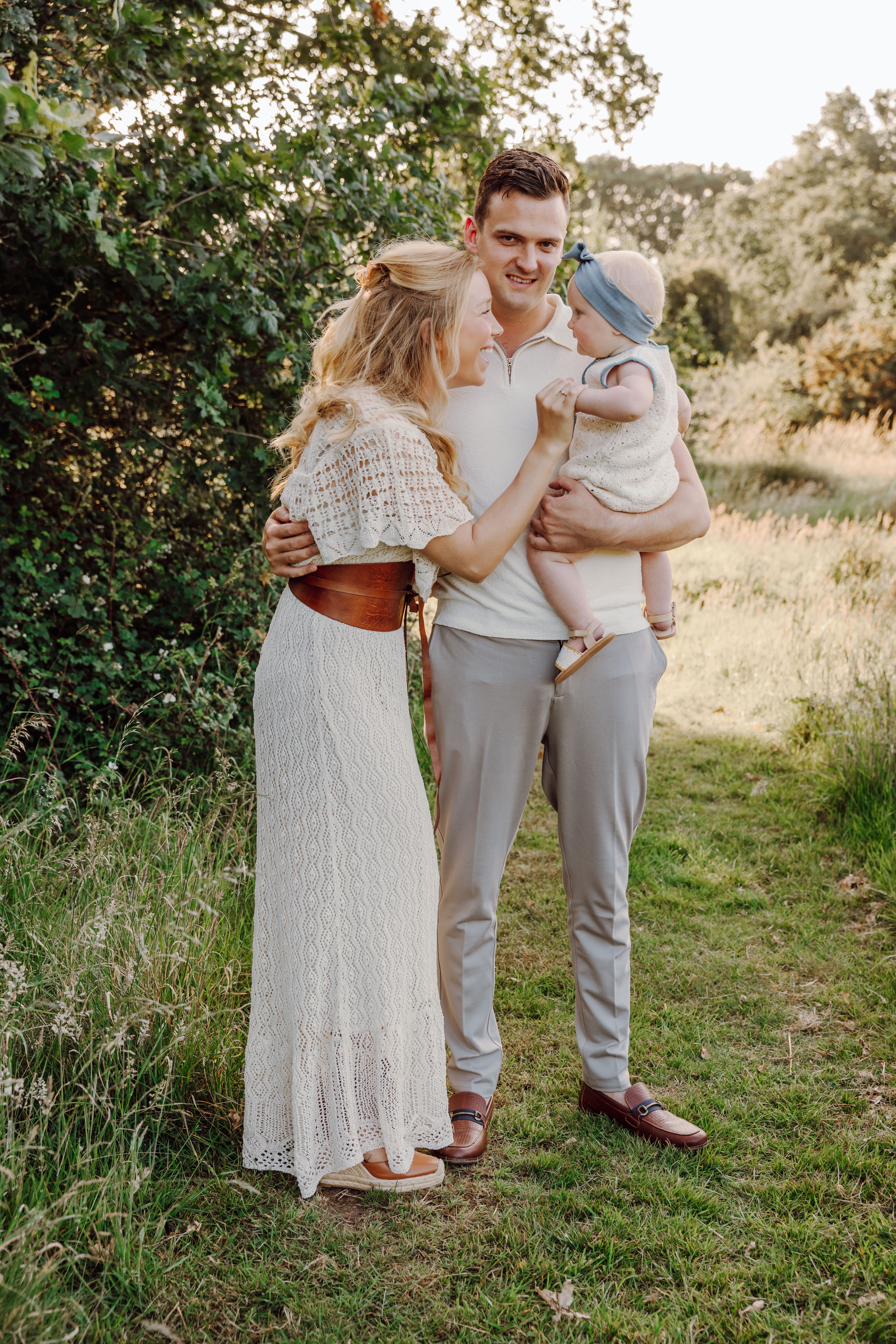 Family portrait in meadow near Waterlooville at sunset