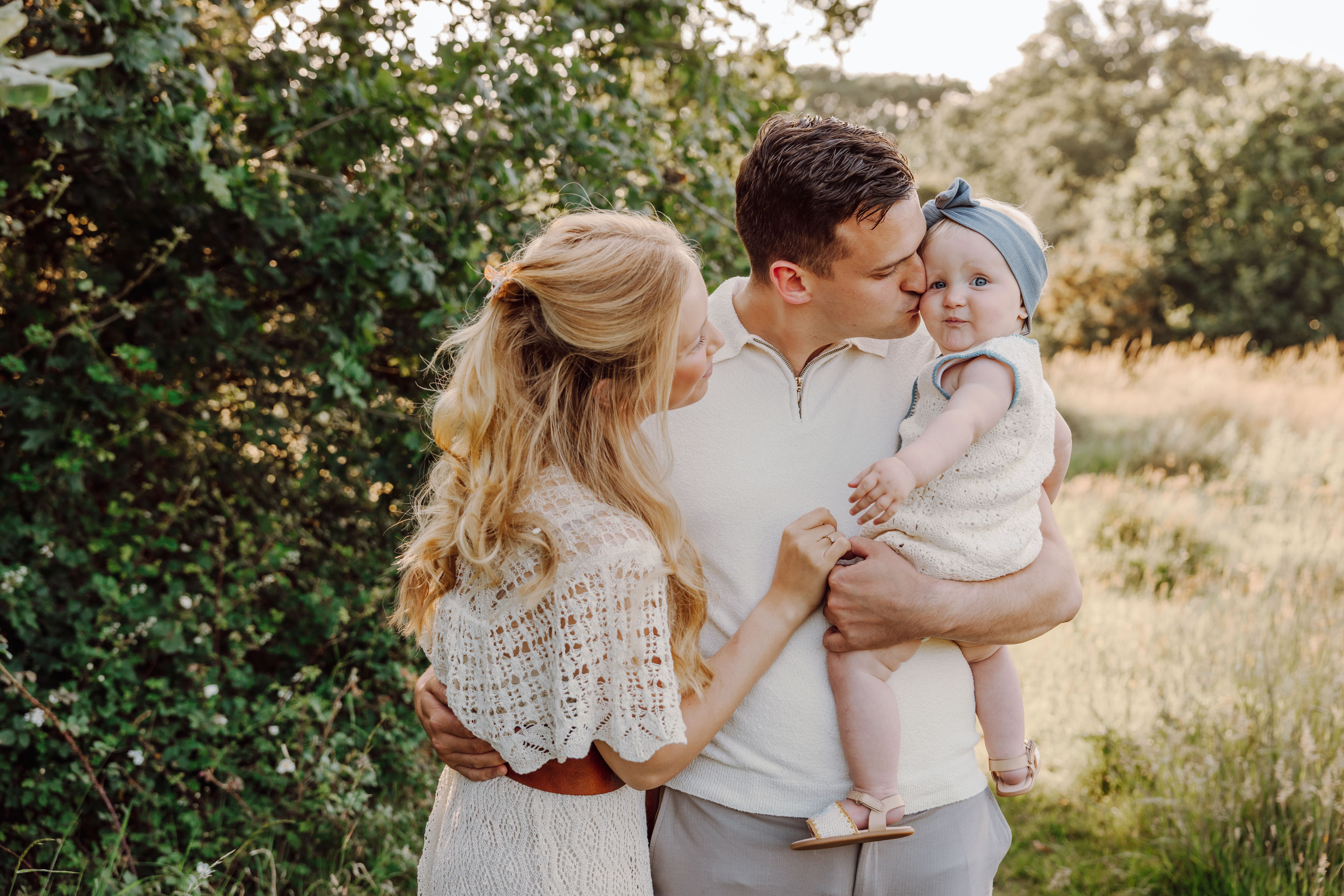 Family portrait in meadow near Waterlooville at sunset
