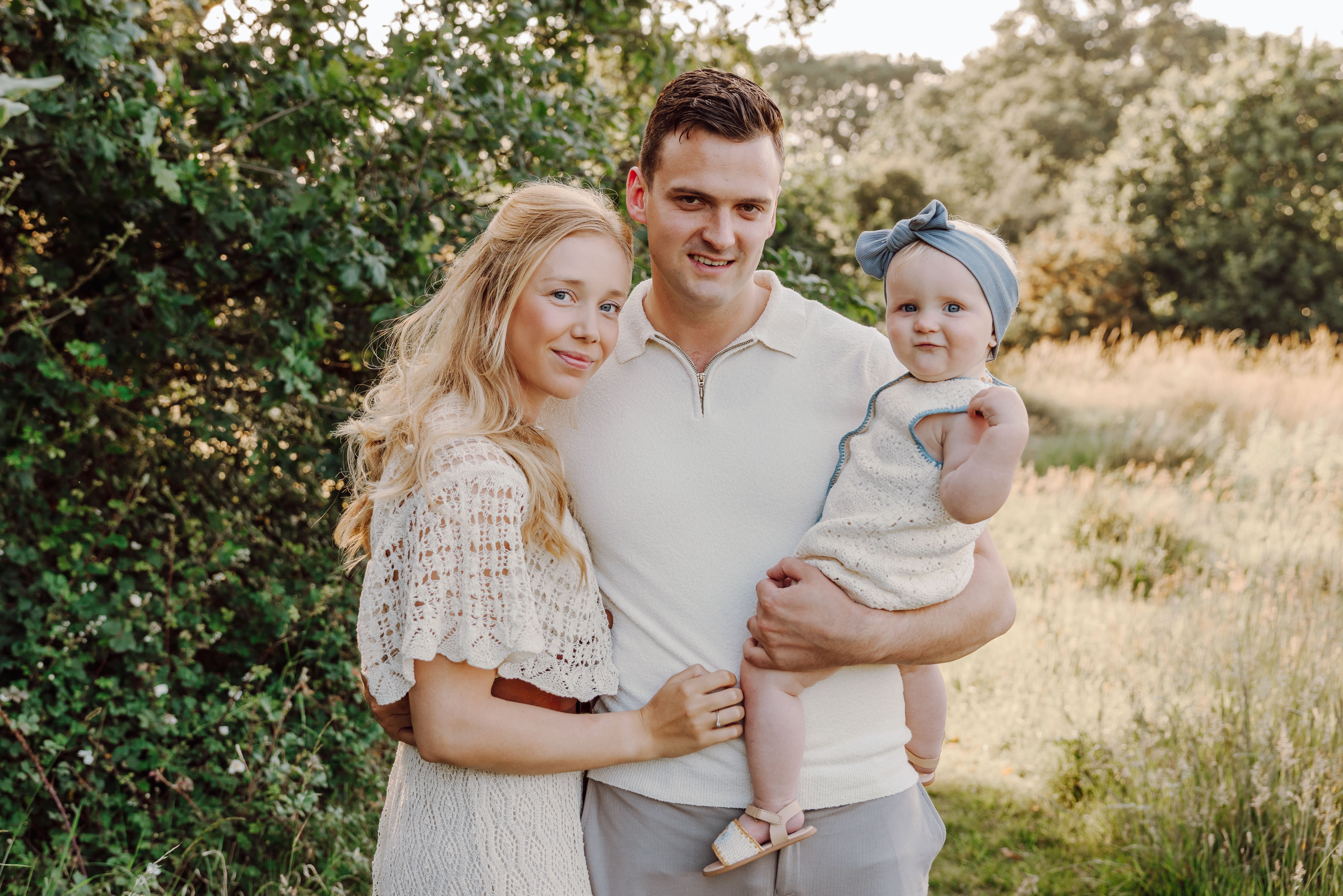 Family portrait in meadow near Waterlooville at sunset