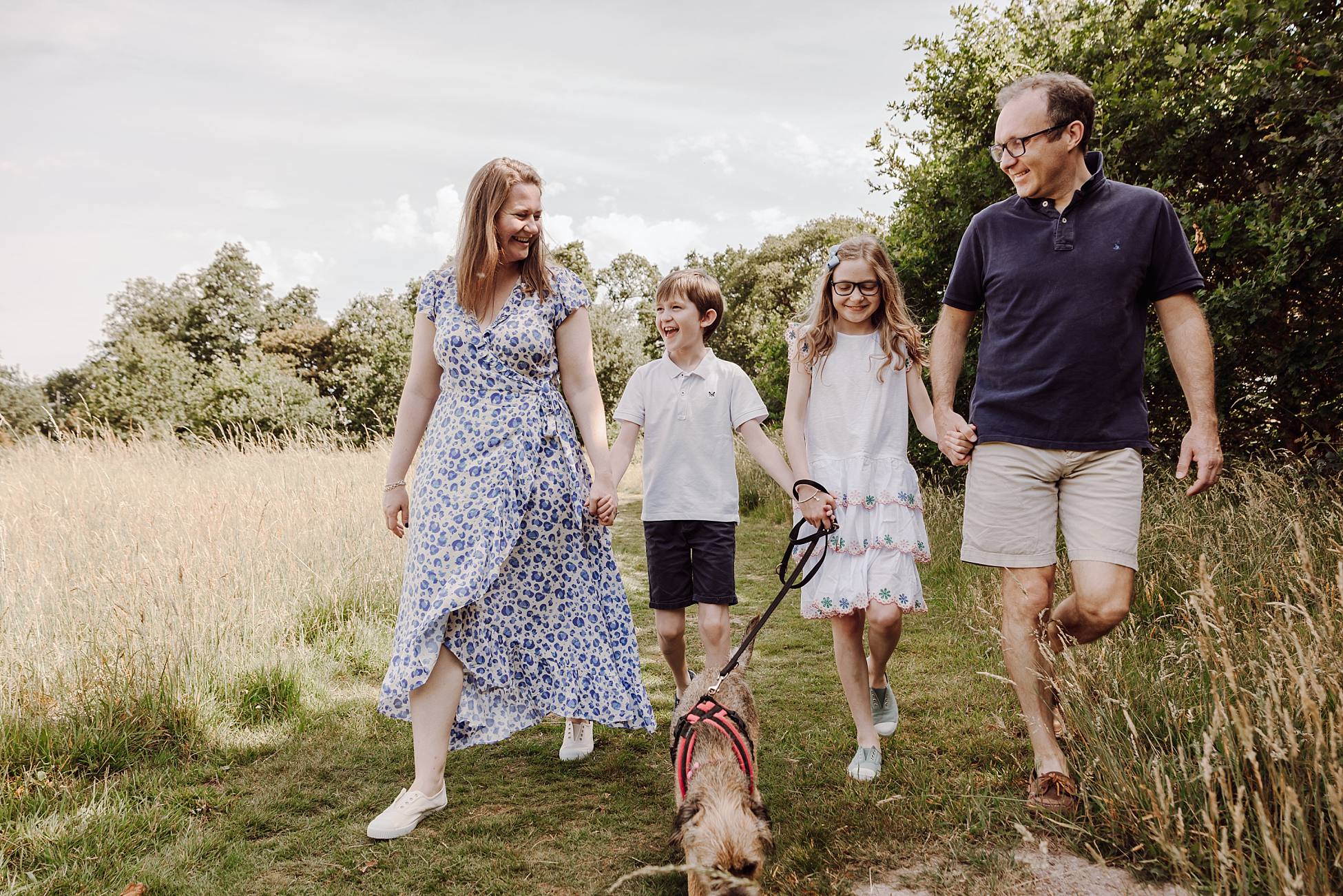 Children running and playing during natural outdoor family photography session