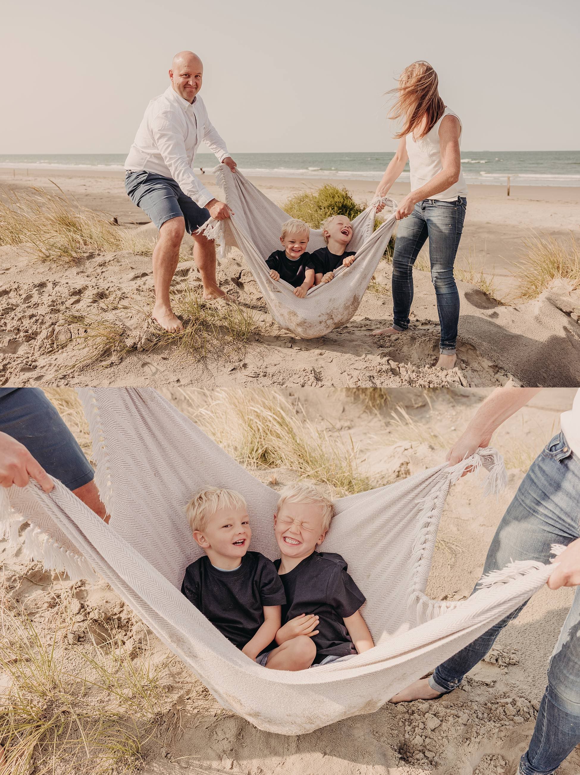 Parents swinging their two young boys by the sea at West Wittering Beach