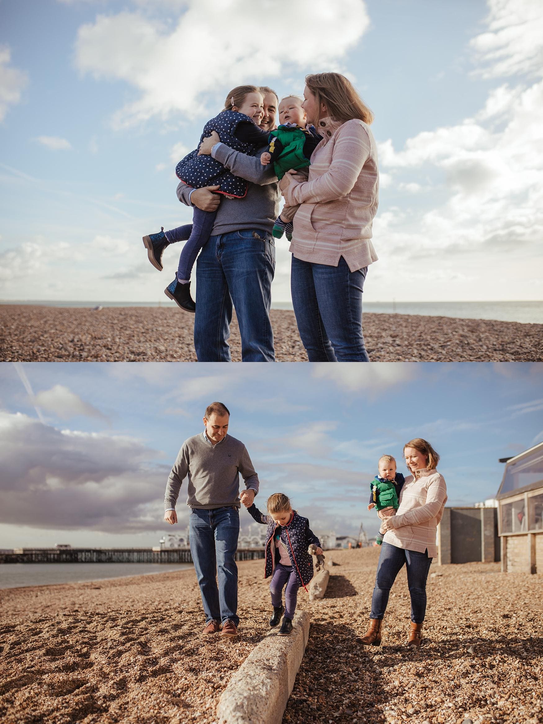Mother holding her baby while father walks hand in hand with their daughter on Southsea seafront during a family photoshoot.