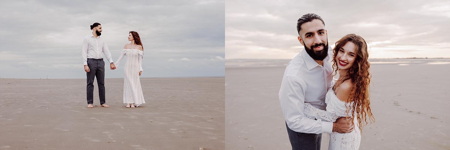 Romantic golden hour portrait of couple embracing on sandy beach at West Wittering engagement session.