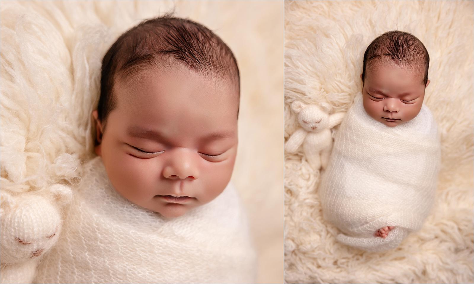Sleeping newborn baby boy wrapped in white, peaceful close-up portrait Littlehampton West Sussex