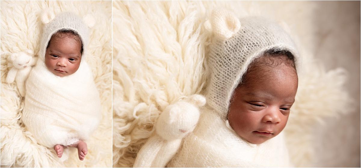 newborn-bear-bonnet-havant-home-session Newborn in a cream knitted bear bonnet with a small knitted bear during an at-home session